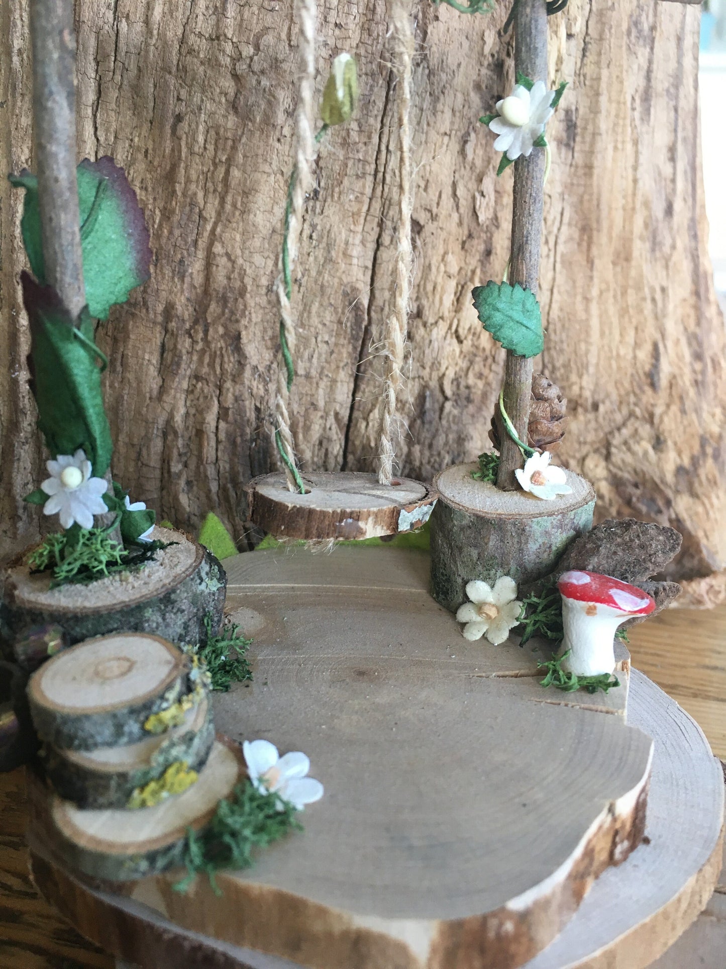 Foraged wood Fairy Swing in pretty garden