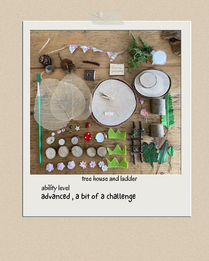 DIY fairy tree house with table, step ladder and tiny liberty print bunting