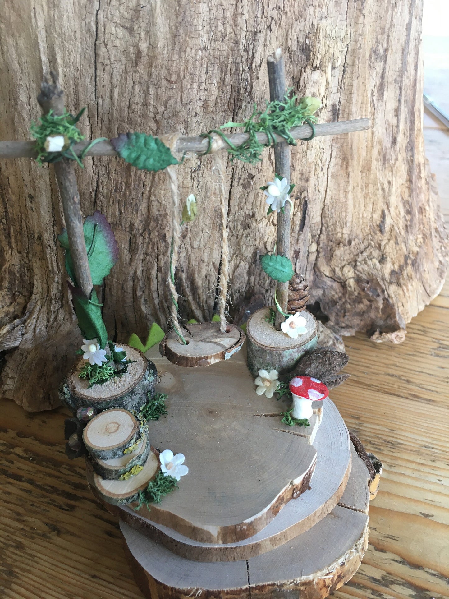 Foraged wood Fairy Swing in pretty garden