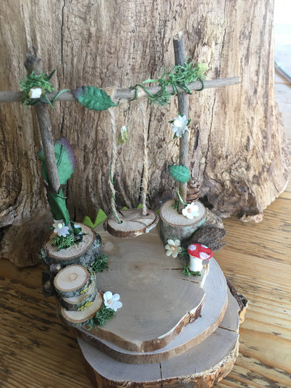 Foraged wood Fairy Swing in pretty garden