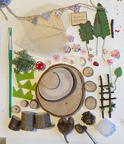 DIY fairy tree house with table, step ladder and tiny liberty print bunting