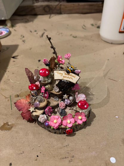 DIY Fairy Garden Kit with a ‘ tiny toadstool garden ‘sign and three toadstools