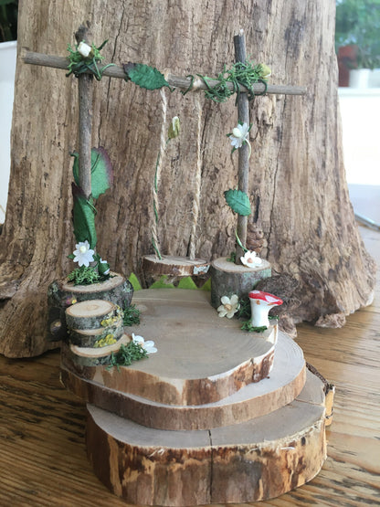 Foraged wood Fairy Swing in pretty garden